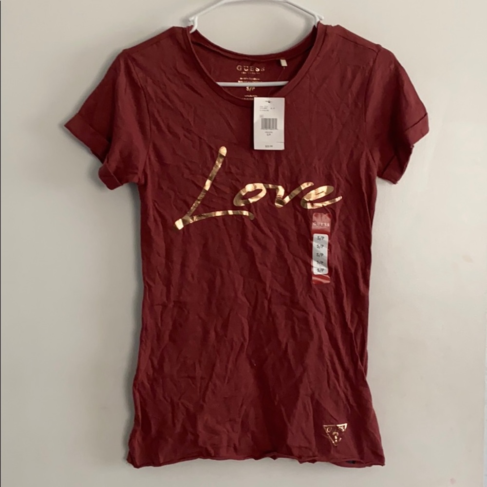 GUESS tee. New! Never worn. Small.